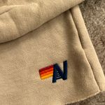 Aviator Nation  Rugby Bolt Stitch Cropped Crewneck in Sand Beige Photo 5