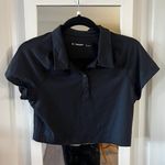 252 TNA Action Cropped Short Sleeve Polo Size Large Color Black Aritzia Photo 1
