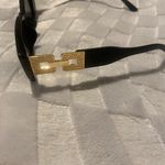 Sunglasses Bllack With Gold Trim.. Worn once Photo 5