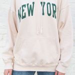 Brandy Melville Cream/Pastel Yellow Christy New York Oversized Hoodie Photo 0