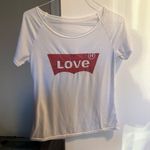 Free with any order white T Photo 4