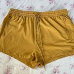 Billabong mustard yellow drawstring shorts Photo 0