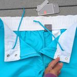 NWT Low Rise Swishy Pants | Women's Nike Blue Track Pants Photo 4