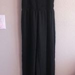 Anthropologie NWT first Monday black distressed hem jumpsuit Photo 1