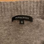Olivaceous Color Block Sweater Photo 1