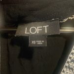 Loft XS long sleeve black romper with white embroidery Photo 1