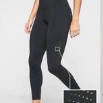 Athleta  contender laser cut 7/8 tight size medium Photo 0