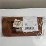 Free People distressed vegan wallet Photo 1