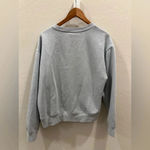 Champion women’s fleece lined sweat light blue size L Photo 1