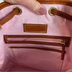 Dooney & Bourke  Pebble Grain Drawstring Hobo Bucket Bag Brown Pink Interior Photo 4