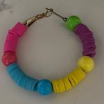 Vibrant Green and Purple Hoop Earrings Photo 3