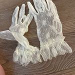 New white lace wrist length ruffle gloves with pearl embellishments Photo 4