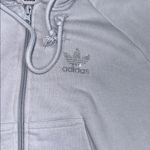 Adidas  cropped light blue rhinestone hoodie size small Photo 4