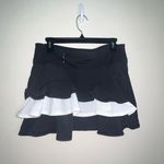 Chic Black and White Ruffled Mini Golf Skirt size large Photo 5
