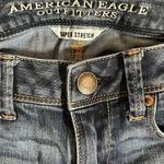 American Eagle  Womens Mid Rise Super Skinny 4 Long Jeans Whiskered Front Photo 5