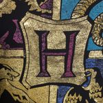 FINAL MARKDOWN Juniors’ Harry Potter Hogwarts Crest SS Tee (L) Size undefined Photo 4