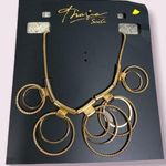 Thalia Sodi  gold hoops statement necklace Photo 1