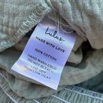 Lulus Daniyah Sage Green Smocked Flutter Sleeve Wide-Leg Jumpsuit Photo 9