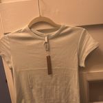 SKIMS Ivory DROP NEEDLE POINTELLE BABY TEE Photo 4