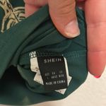 SheIn Top - green riders graphic crop top Photo 2