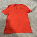 Cotopaxi  woman’s orange short sleeve tee XS VGUC Photo 1