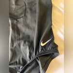 Nike  Black and White Striped One-Piece Swimsuit Photo 1