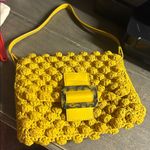 Yellow Textured Handbag with Strap and buckle Photo 0