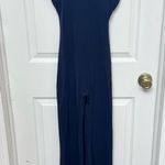 Like new navy workout jumpsuit romper with ruched butt and open back MEDIUM Blue Photo 0