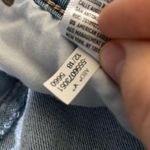 American Eagle  button through high rise light wash mini denim skirt size 00 Photo 8