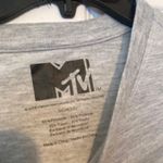 MTV Brand MTV short sleeve shirt is a size Small. Photo 2