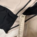 Fabletics  Beige and Black Stitch Top Photo 3