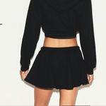 SKIMS Cotton Fleece Mini Skirt Onyx Black Size XXS in Onyx - With Pockets Photo 1