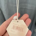 Pink Blush new with tag size medium. Should cut out Photo 7