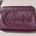 Coach Genuine Soft Leather Pleated Wristlet
Purple with Silver-Tone Hardware Photo 0
