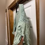 Umgee  Medium sage green split ruffled bell sleeve with lace arm detail top Photo 1