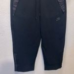 Nike NWT Tech Pack Black Capri Sweats Zip Up Legs Pockets Sweatpants Photo 2