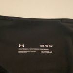 Under Armour NWOT women’s solid black athletic active wide band capri leggings M Photo 5