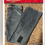 X2 Women's Blue Straight Leg Jeans with Black Patch Size 4 Photo 1