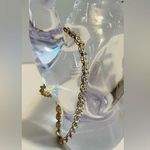 Gold over sterling silver Tennis bracelet with heart charm. Photo 2