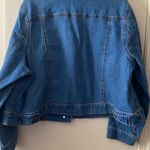 Woman Within Denim Jacket Photo 1