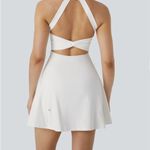 Halara Backless Twisted Flare Mini Dance Active Dress-Longer Length Photo 1