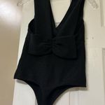 EXPRESS RIBBED PLUNGE NECK BOW BACK THONG BODYSUIT Photo 6
