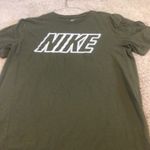 Women’s size medium olive green Nike T-shirt Photo 3