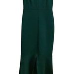 Sweet Storm Hi Low Mermaid Style Dress Size S  94% Polyester 6% Spandex Lining 100% Polyester   Approximate measurements  Pit to pit 15 Length 49-54.5 Waist 13   This stunning  dress is perfect for any formal occasion. The mermaid style and hi-low cut make it both elegant and fashionable. The dress is sleeveless and made of high-quality polyester material in a beautiful green color.   The back zipper adds a touch of sophistication while the solid pattern and mermaid character make it a unique piece. The dress is available in size S and is perfect for any regular-sized women. Don't miss out on the opportunity to add this beautiful dress to your wardrobe! Photo 2