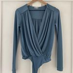 Free People  Turnt Sheen Long Sleeve Slinky Bodysuit in Blue Metal Size S Photo 4