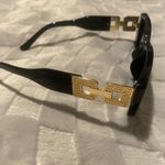 Sunglasses Bllack With Gold Trim.. Worn once Photo 0