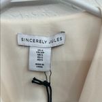 Ivory Sleeveless Vest by Sincerely Jules Photo 1