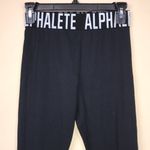 Alphalete Women’s Athletic Spell Out Waistband Criss Cross Cutout Black Leggings Photo 1