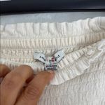 American Eagle  Outfitters Cream Jumpsuit with Chic Design Photo 1