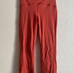Lululemon  leggings Salmon orange with floral detailing Sz 4 Photo 1